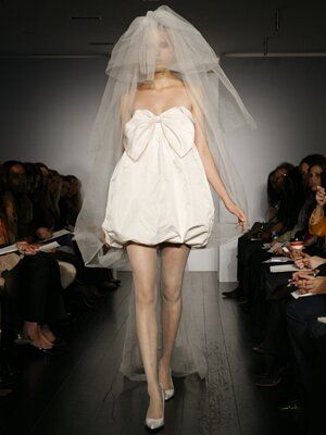 Wedding dresses that go from long to short Photo - 2